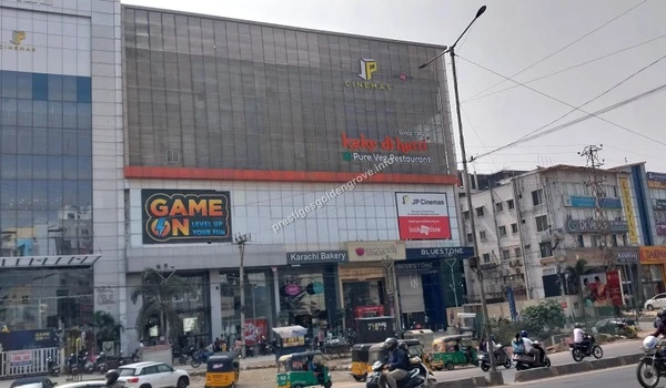 JP Cinemas Complex Exterior view of the commercial complex with JP Cinemas and Game On located near Prestige Golden Grove in Hyderabad