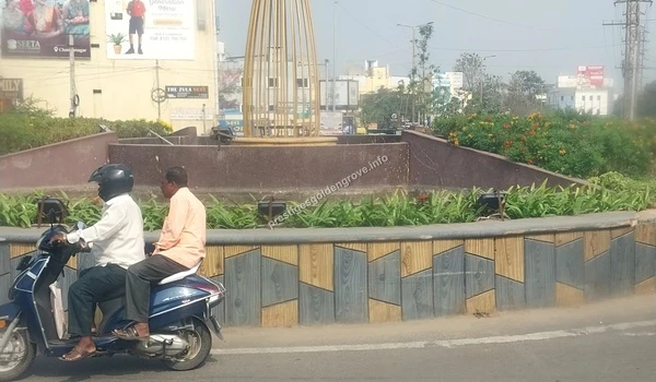Tellapur Main Junction Lush green landscaping and modern street structures at the Tellapur Junction highlighting the scenic and well-maintained approach to Prestige Golden Grove